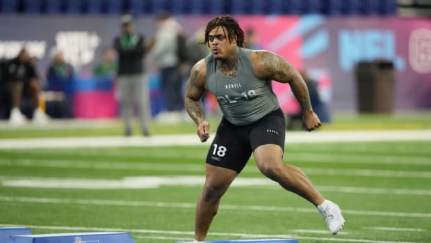 Feb 29, 2024; Indianapolis, IN, USA; Texas defensive lineman Byron Murphy (DL18) works out during the 2024 NFL Combine at Lucas Oil Stadium. Mandatory Credit: Kirby Lee-USA TODAY Sports